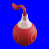 Red bulb syringe with a clear chamber on a white background