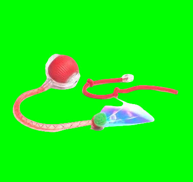Red toy with a colorful feather on a white background