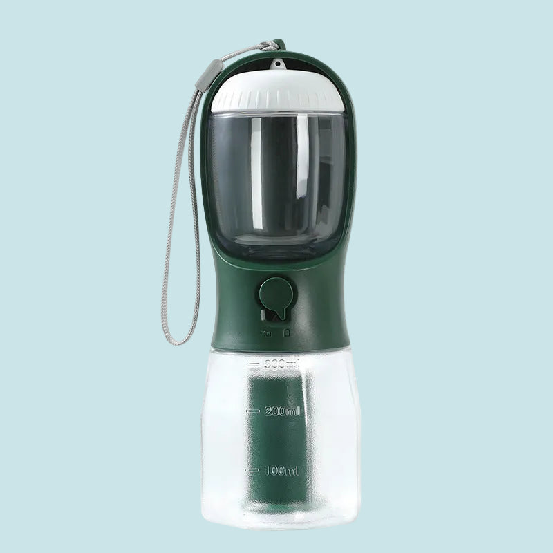 Green and clear portable pet water bottle with a strap on a white background