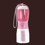 Pink pet water bottle with a white cap on a white background