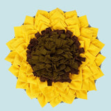 Sunflower-shaped pet mat with yellow petals and brown center on a white background