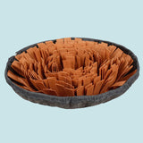Pet bed with brown crumpled paper and gray border on a white background