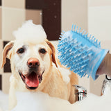 Dog being bathed with a blue pet grooming brush in a bathroom setting.
