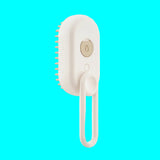 White grooming tool with bristles on a white background