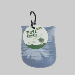 Blue pet toy with a carabiner and 'Soft Gentle' label on a white background