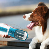 Dog with a blue and white portable water bottle by a body of water