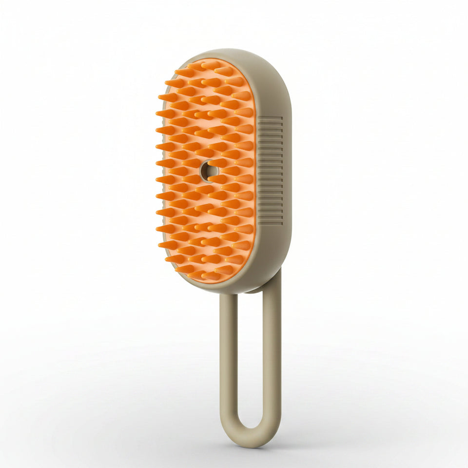 Pet grooming brush with orange bristles and beige handle on a white background