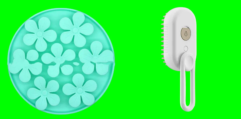 Mint green flower-shaped object and white handheld brush on a white background