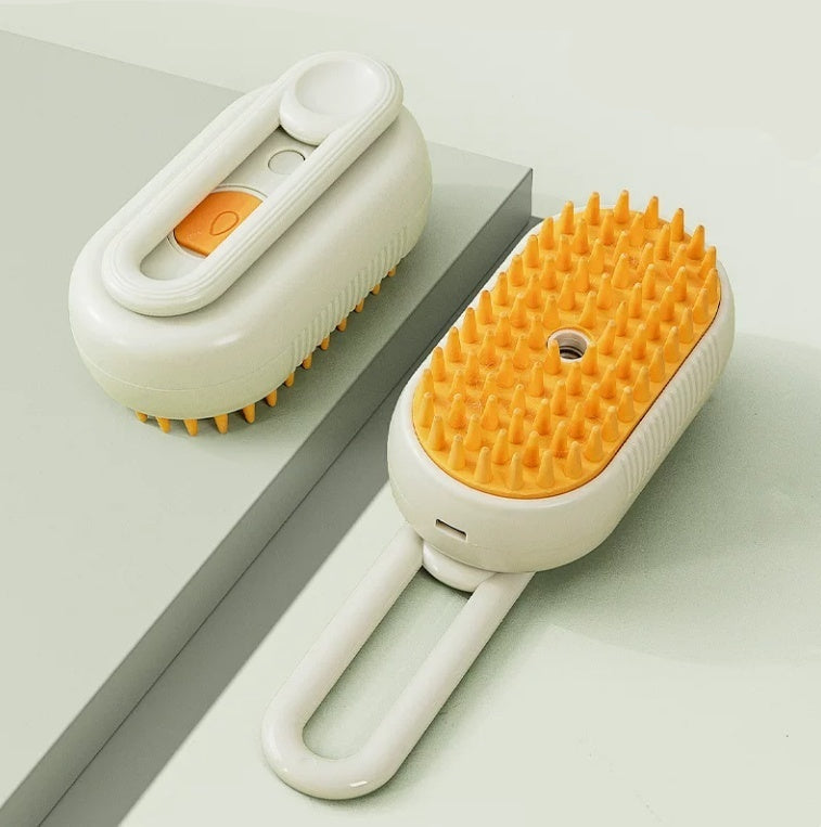 White and orange grooming brush on a light gray surface