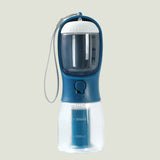Blue and clear portable water bottle with measurement markings on a white background