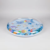Inflatable water-filled ice pad with cartoon sea creatures on a blue background